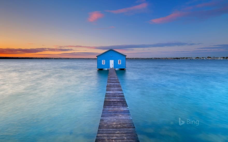 Sunrise over the Matilda Bay boathouse in the Swan River, Perth, Australia