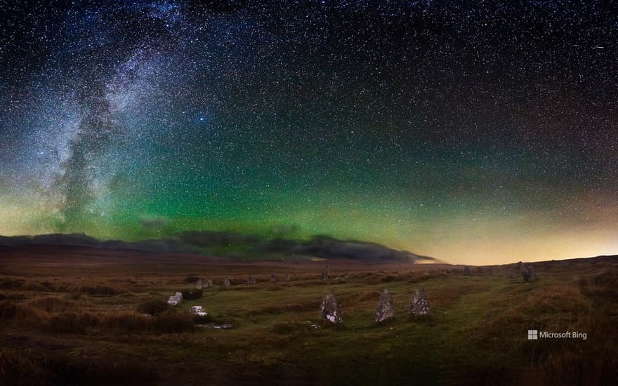 Dartmoor's Scorhill Stone Circle under a starry night sky, Devon.